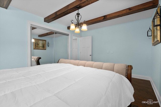 515 W Diversey Ave, Addison, IL 60101 - bedroom with dark wood-style floors, a closet, a chandelier, and beamed ceiling