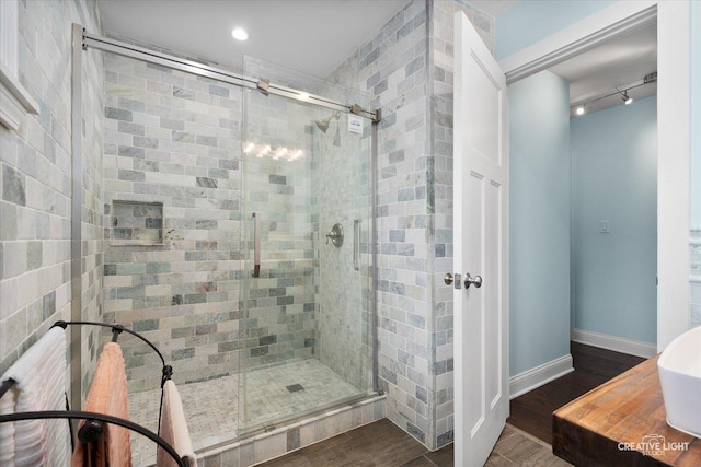 515 W Diversey Ave, Addison, IL 60101 - bathroom with a shower stall and wood finished floors