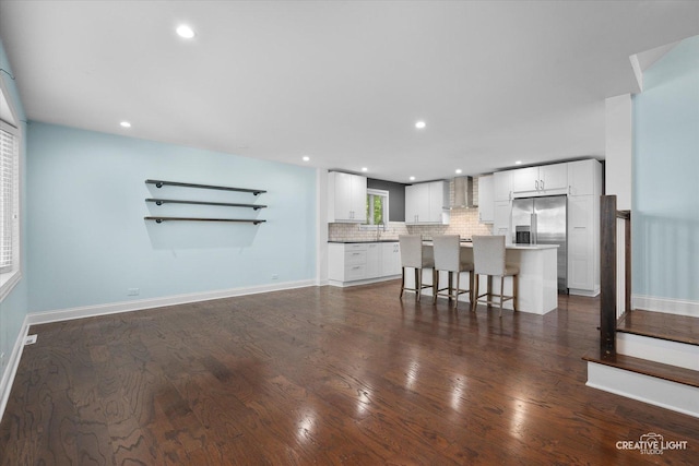 515 W Diversey Ave, Addison, IL 60101 - living room featuring dark wood-style floors and recessed lighting