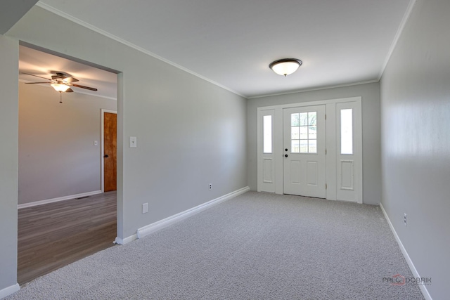 2422 E Grand Ave, Lindenhurst, IL 60046 - entryway with light carpet, crown molding, and a ceiling fan