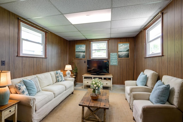 2422 E Grand Ave, Lindenhurst, IL 60046 - living area featuring plenty of natural light, a paneled ceiling, and wood walls