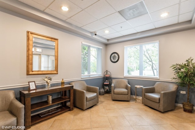 390 S Western Ave Unit 512, Des Plaines, IL 60016 - living area featuring light tile patterned flooring, a raised ceiling, and a paneled ceiling