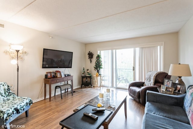 390 S Western Ave Unit 512, Des Plaines, IL 60016 - living room featuring light wood-style flooring and baseboards