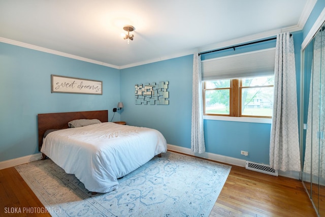 21W724 Park Ave, Lombard, IL 60148 - bedroom featuring wood finished floors and ornamental molding