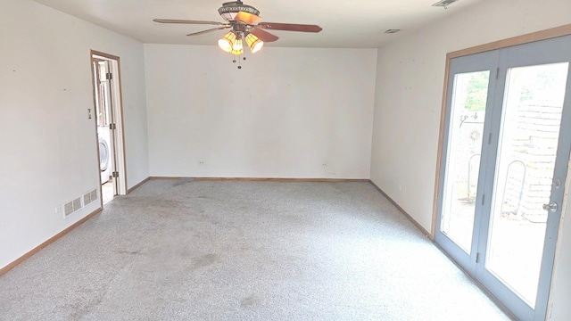 8543 Carriage Ln, Tinley Park, IL 60487 - spare room with a ceiling fan, washer / clothes dryer, and light colored carpet