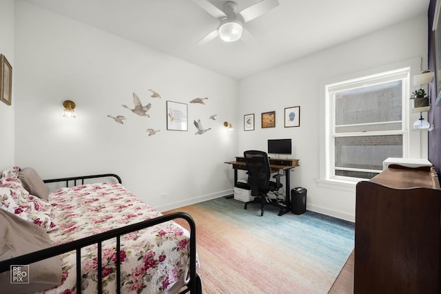 1252 W Pratt Blvd Unit 2, Chicago, IL 60626 - bedroom featuring a desk, light wood-style floors, and a ceiling fan