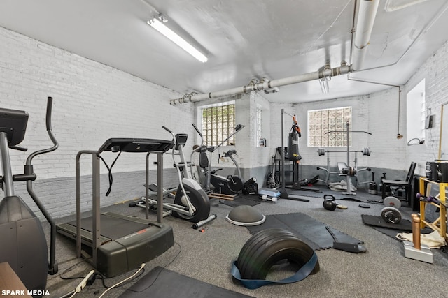 1252 W Pratt Blvd Unit 2, Chicago, IL 60626 - gym featuring brick wall