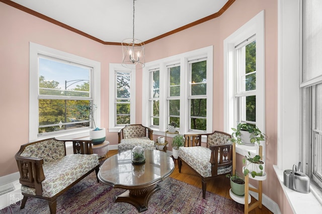 1252 W Pratt Blvd Unit 2, Chicago, IL 60626 - sunroom / solarium with a chandelier