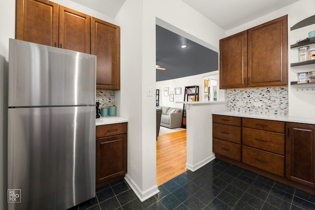 1252 W Pratt Blvd Unit 2, Chicago, IL 60626 - kitchen with freestanding refrigerator, open shelves, dark tile patterned flooring, light countertops, and recessed lighting
