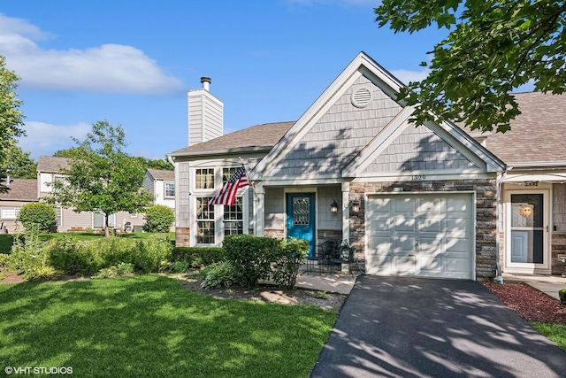 1329 Gloucester Cir, Carol Stream, IL 60188 - view of front of home with driveway, a chimney, an attached garage, a front yard, and roof with shingles
