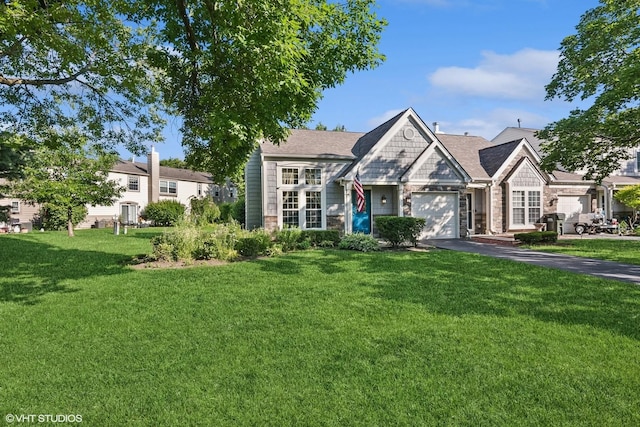 1329 Gloucester Cir, Carol Stream, IL 60188 - view of front facade featuring asphalt driveway, a front lawn, an attached garage, stone siding, and roof with shingles