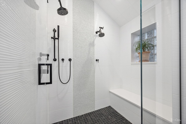 5401 Carpenter St, Downers Grove, IL 60515 - bathroom with a tile shower, lofted ceiling, tile patterned floors, and tile walls