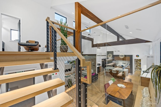 5401 Carpenter St, Downers Grove, IL 60515 - staircase featuring high vaulted ceiling, beamed ceiling, and wood finished floors