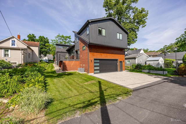 5401 Carpenter St, Downers Grove, IL 60515 - view of front of property with a garage, driveway, and a residential view