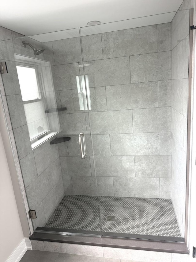 232 S Walnut St, Glenwood, IL 60425 - bathroom with a stall shower and tile patterned flooring
