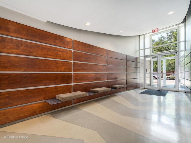 1100 W Montrose Ave Unit 207, Chicago, IL 60613 - common area with recessed lighting, a wall of windows, and a high ceiling