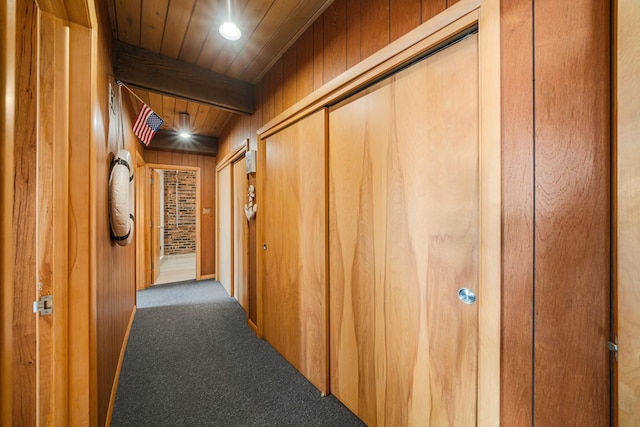 309 Holiday Dr, Lake Holiday, IL 60552 - corridor featuring carpet floors, a wooden ceiling with exposed beams, and wood walls