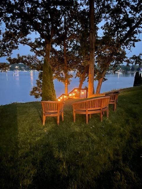 309 Holiday Dr, Lake Holiday, IL 60552 - view of green lawn featuring a water view
