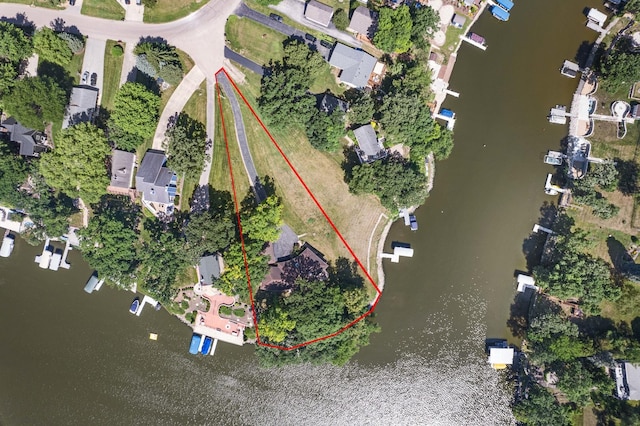309 Holiday Dr, Lake Holiday, IL 60552 - aerial view of residential area featuring a nearby body of water and property parcel outlined