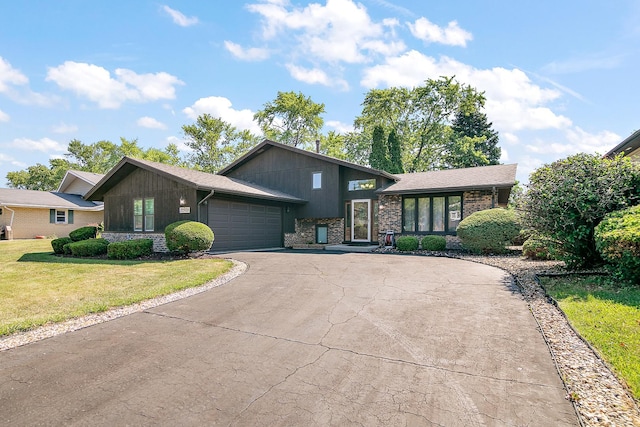 22939 E Dr, Richton Park, IL 60471 - split level home with driveway, a garage, and a front yard