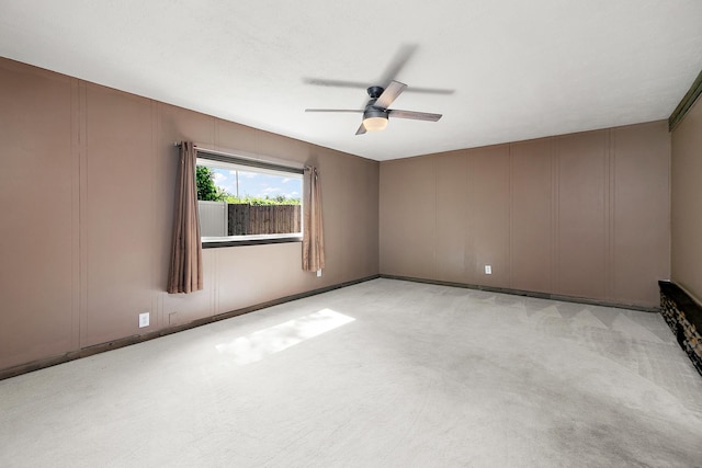 22939 E Dr, Richton Park, IL 60471 - spare room featuring a decorative wall, a ceiling fan, and light carpet