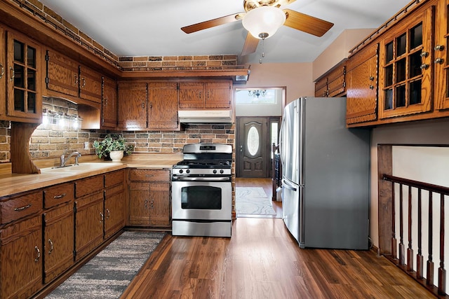 22939 E Dr, Richton Park, IL 60471 - kitchen with appliances with stainless steel finishes, exhaust hood, light countertops, and brown cabinets