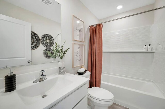 448 Lakeshore Ct, Saint Charles, IL 60174 - bathroom with vanity and shower / tub combo with curtain