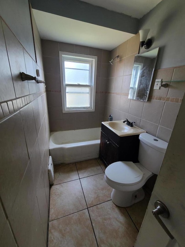 3 E 140th Ct, Riverdale, IL 60827 - bathroom featuring tile walls, tile patterned floors, vanity, and bathtub / shower combination