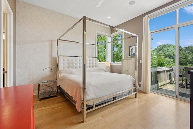 2047 N Leavitt St Unit 2N, Chicago, IL 60647 - bedroom featuring access to exterior, wood finished floors, and recessed lighting
