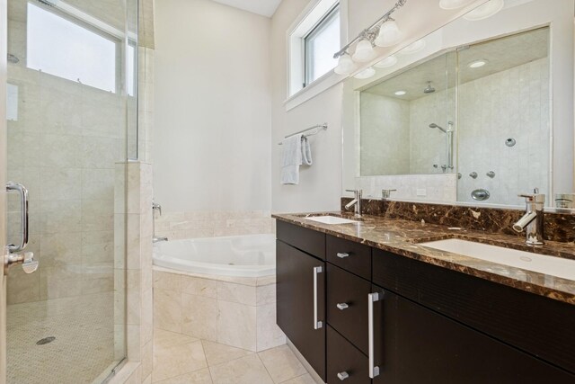 2047 N Leavitt St Unit 2N, Chicago, IL 60647 - bathroom featuring a shower stall, a bath, double vanity, and tile patterned flooring