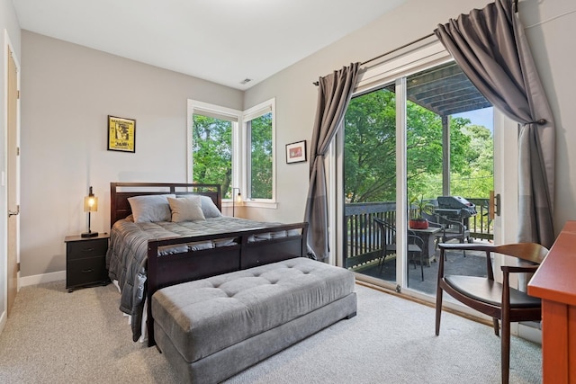 2047 N Leavitt St Unit 2N, Chicago, IL 60647 - bedroom with access to exterior and carpet