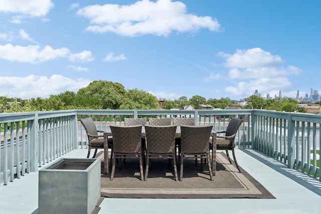 2047 N Leavitt St Unit 2N, Chicago, IL 60647 - wooden terrace featuring outdoor dining space