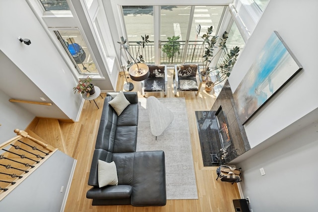 2047 N Leavitt St Unit 2N, Chicago, IL 60647 - living area featuring wood finished floors and a towering ceiling