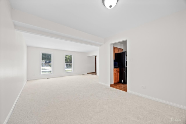 6730 Revere Rd, Downers Grove, IL 60516 - carpeted empty room featuring baseboards