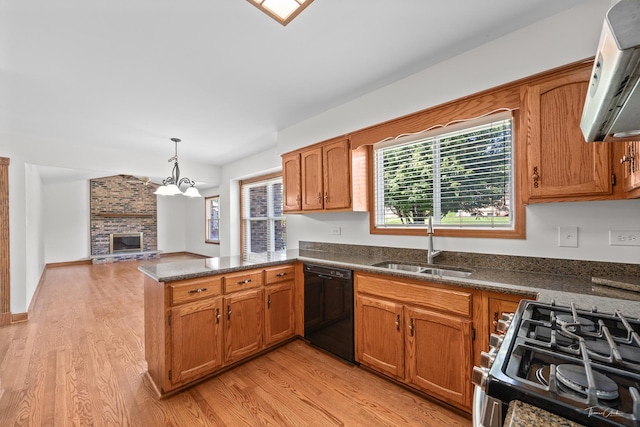 6730 Revere Rd, Downers Grove, IL 60516 - kitchen with black dishwasher, light wood-style floors, brown cabinetry, a peninsula, and healthy amount of natural light
