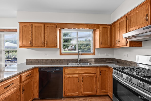 6730 Revere Rd, Downers Grove, IL 60516 - kitchen featuring black dishwasher, gas stove, under cabinet range hood, and healthy amount of natural light