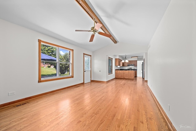 6730 Revere Rd, Downers Grove, IL 60516 - unfurnished living room with light wood finished floors, ceiling fan, and a chandelier