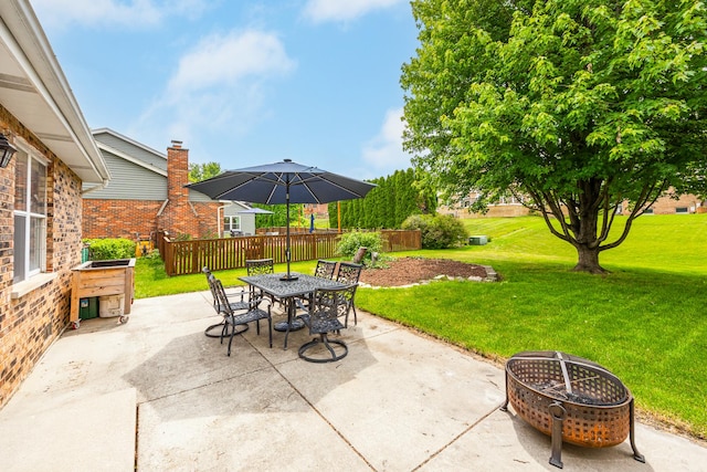 6730 Revere Rd, Downers Grove, IL 60516 - view of patio / terrace with outdoor dining area and a fire pit