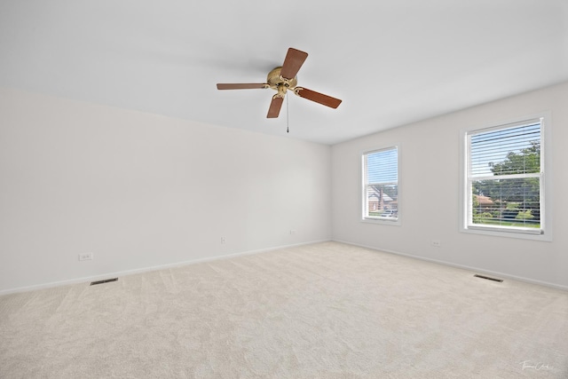 6730 Revere Rd, Downers Grove, IL 60516 - carpeted empty room featuring baseboards and ceiling fan