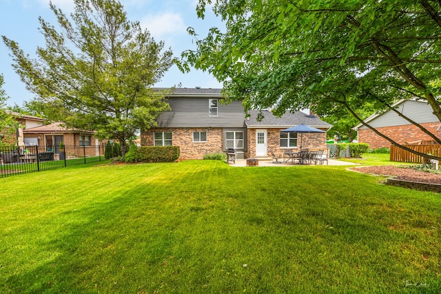6730 Revere Rd, Downers Grove, IL 60516 - back of house featuring a patio and brick siding