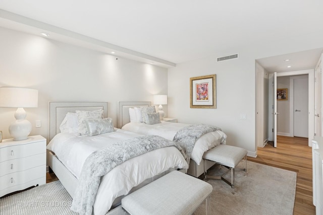 132 E Delaware Pl Unit 5101, Chicago, IL 60611 - bedroom featuring wood finished floors and recessed lighting