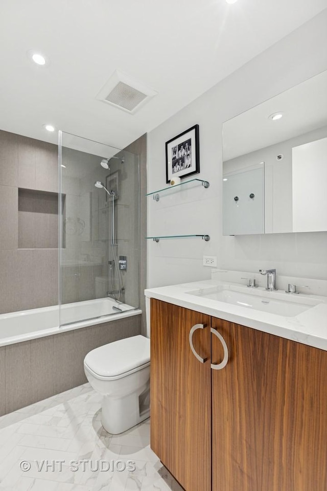 132 E Delaware Pl Unit 5101, Chicago, IL 60611 - full bath featuring vanity, tiled shower / bath combo, marble finish floors, and recessed lighting