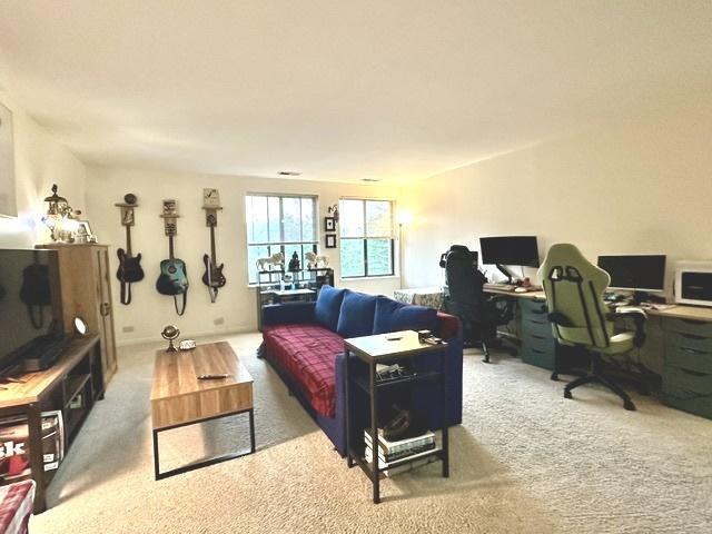 430 Walnut Ave Unit 2308, Lisle, IL 60532 - living room with carpet flooring and a desk