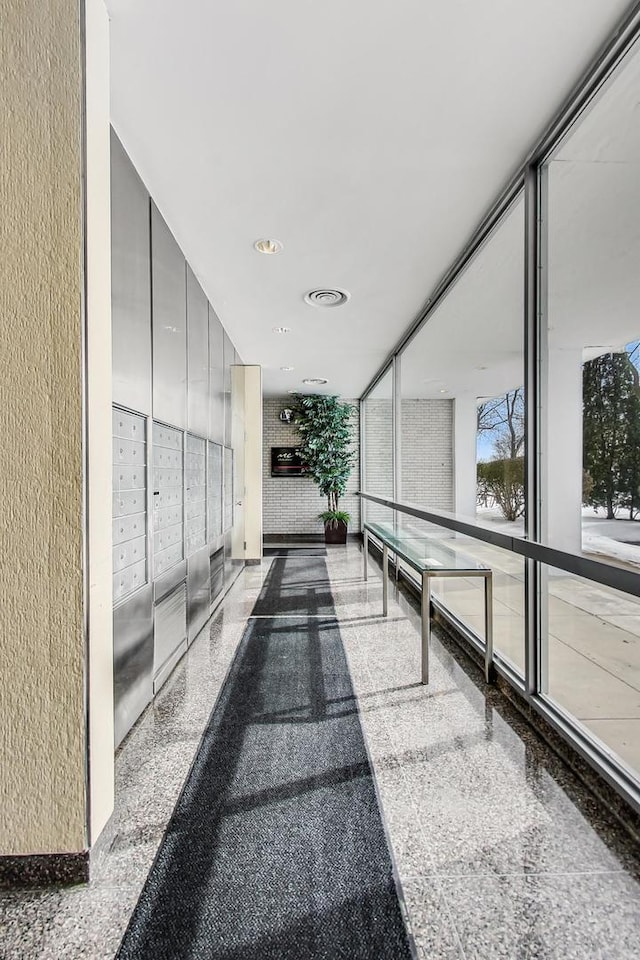 601 E 32nd St Unit 907, Chicago, IL 60616 - hall featuring granite tiled floors and mail area