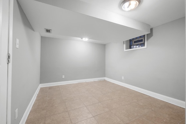 15607 Rose Dr, South Holland, IL 60473 - finished basement with baseboards and light tile patterned floors