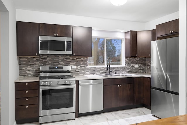 15607 Rose Dr, South Holland, IL 60473 - kitchen with appliances with stainless steel finishes, light marble finish flooring, and light countertops