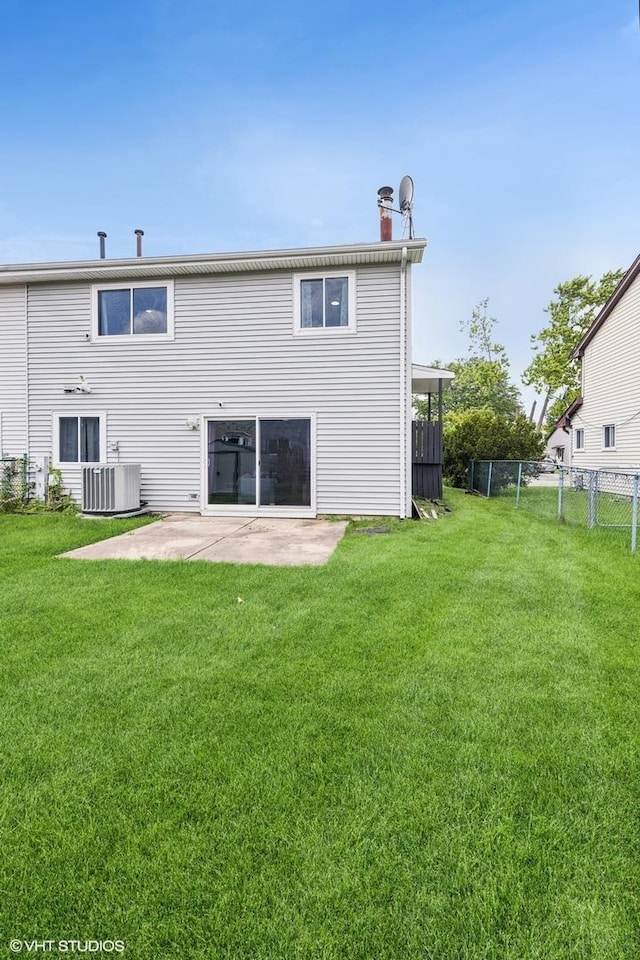 3953 Sandpiper Dr Unit 3953, Hanover Park, IL 60133 - back of property featuring a patio area and a chimney