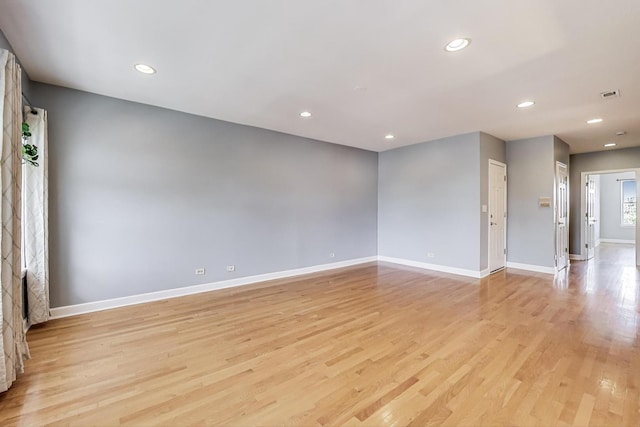 2618 W Rosemont Ave Unit 3, Chicago, IL 60659 - empty room featuring light wood finished floors and recessed lighting
