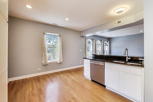 2618 W Rosemont Ave Unit 3, Chicago, IL 60659 - kitchen with dishwasher, white cabinetry, dark stone countertops, light wood-type flooring, and recessed lighting