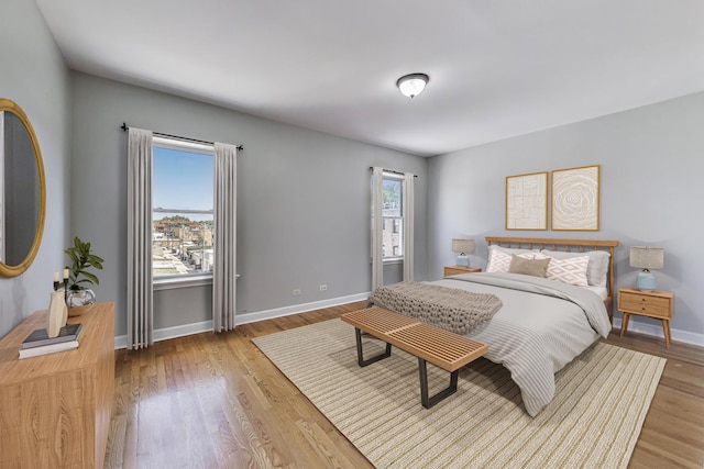 2618 W Rosemont Ave Unit 3, Chicago, IL 60659 - bedroom featuring light wood-style floors and baseboards